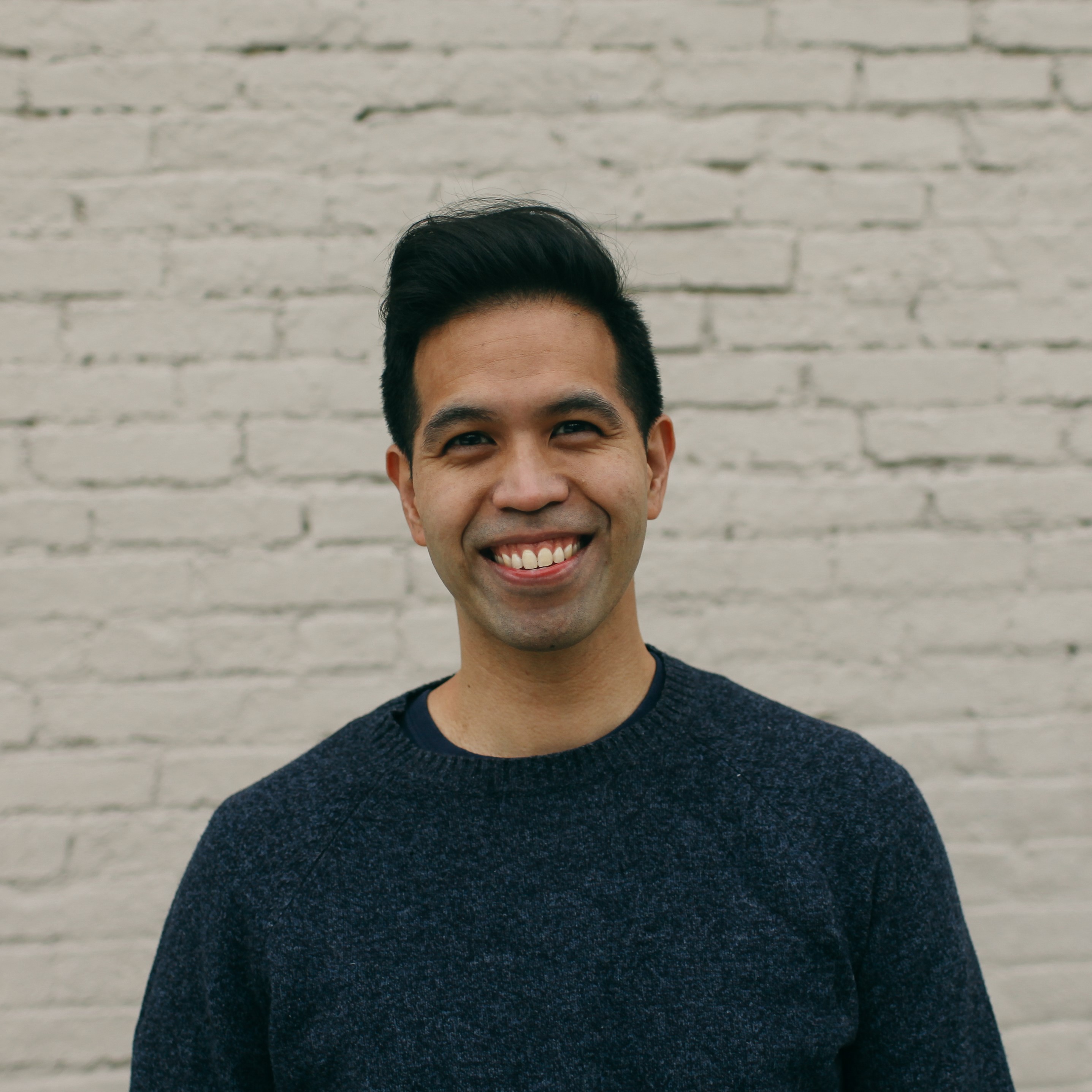 Asian male smiling