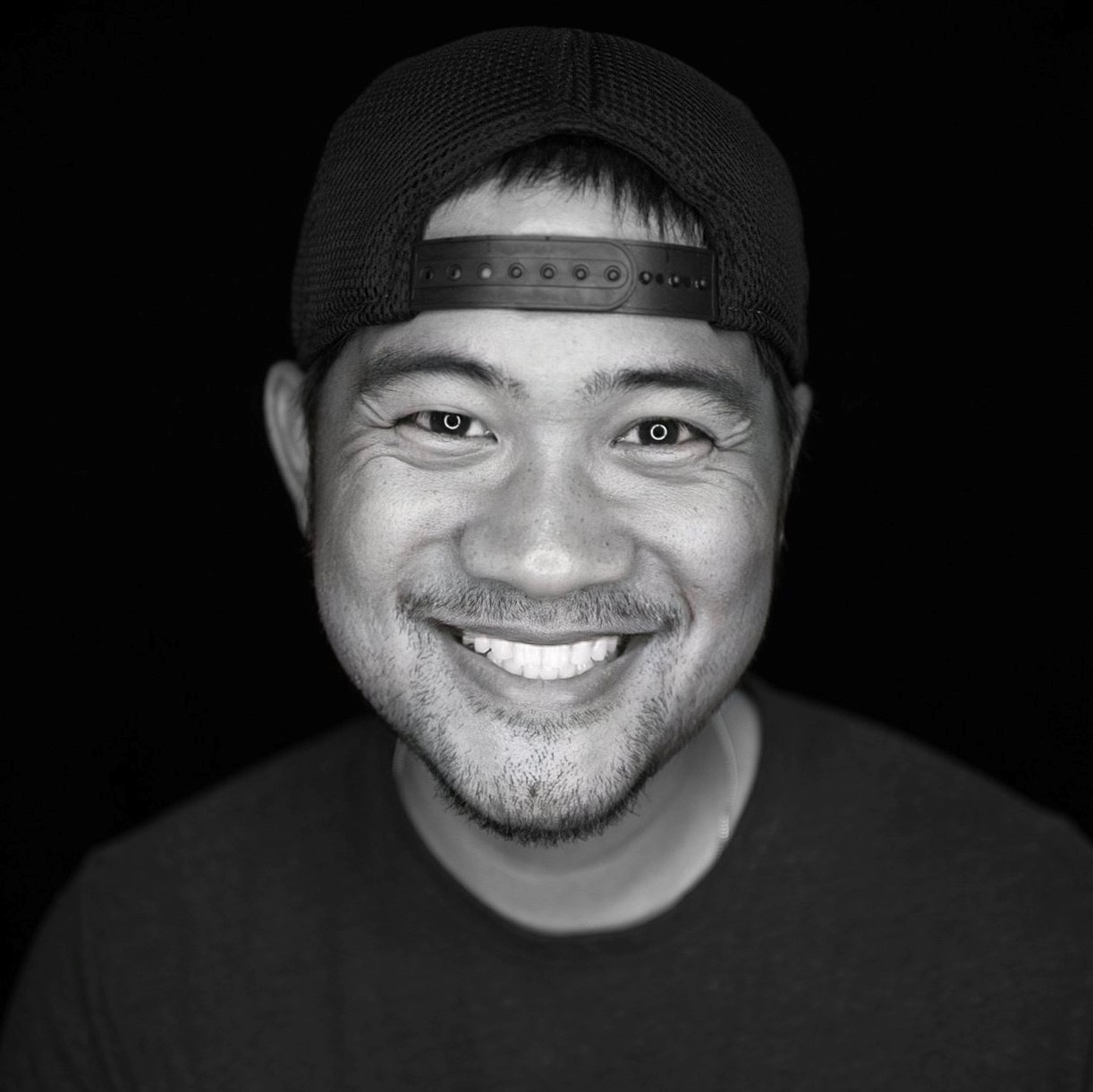 Asian male smiling