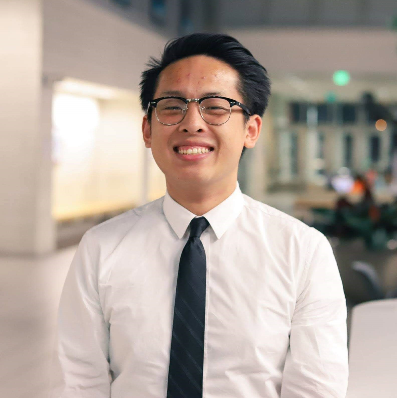 Asian male smiling